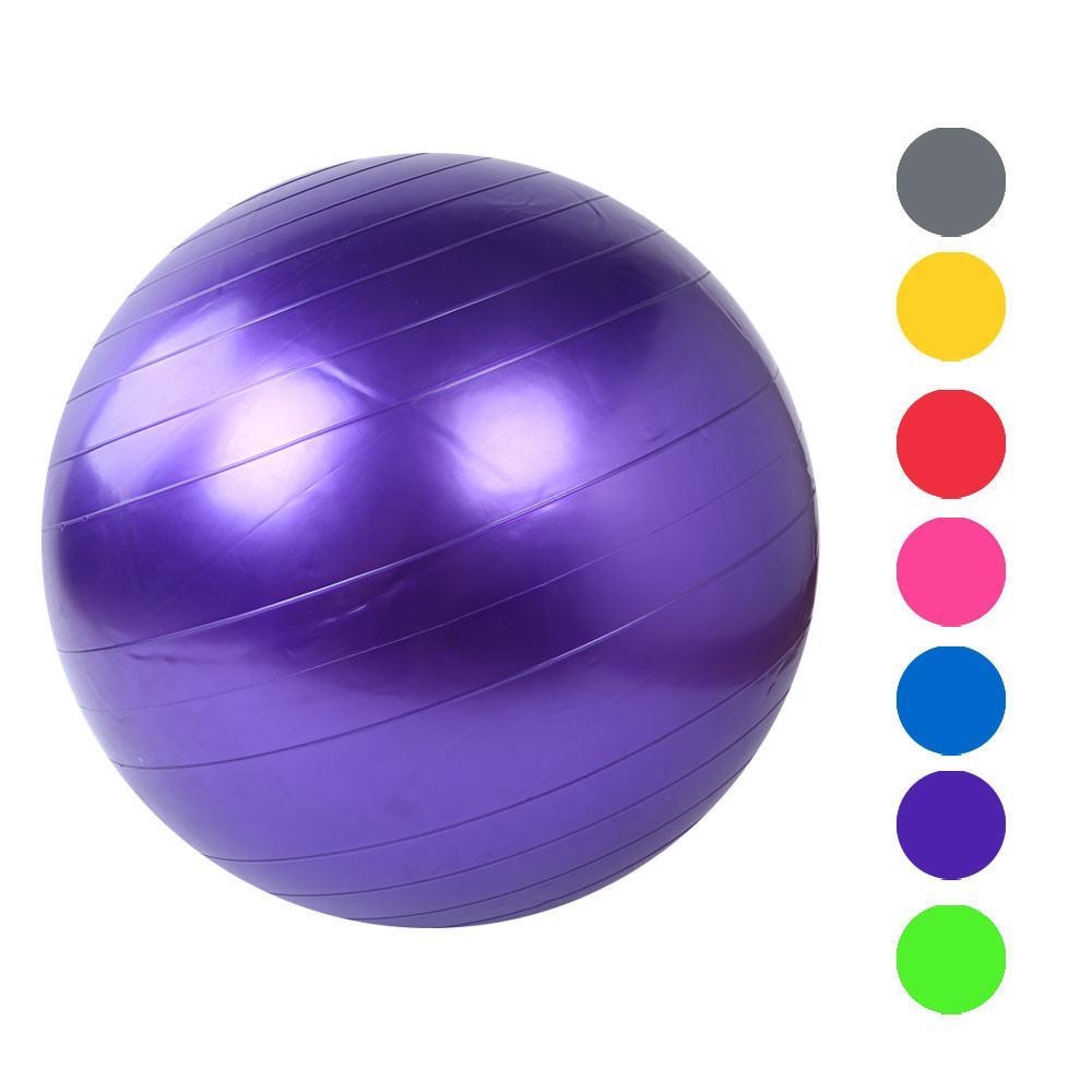 Child playing with a sensory yoga ball for regulation and sensory input